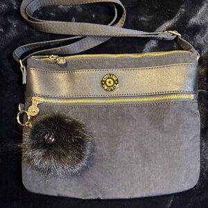 Kipling Luxe Two Compartment Crossbody with Gold Trim, Monkey Poof Ball Charm
